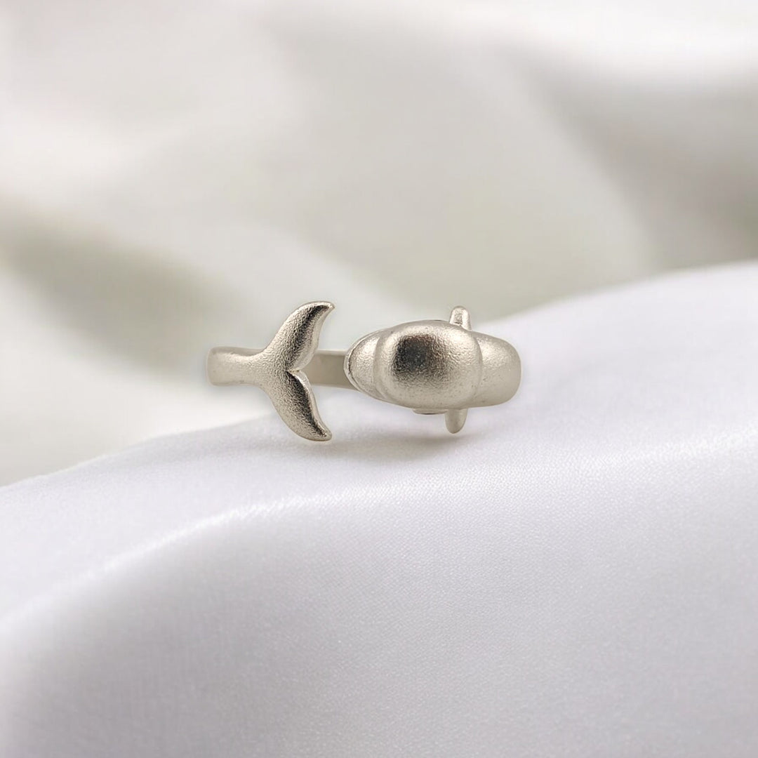 Top view of dolphin ring showing both head and tail details