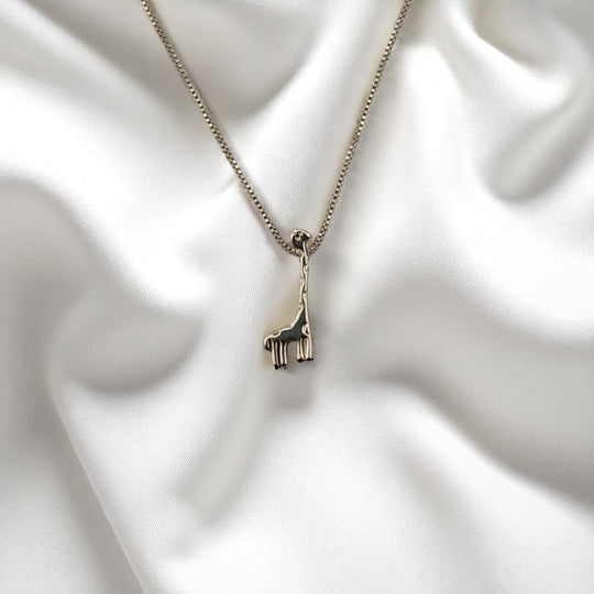 Modern giraffe necklace with eco-conscious silver chain