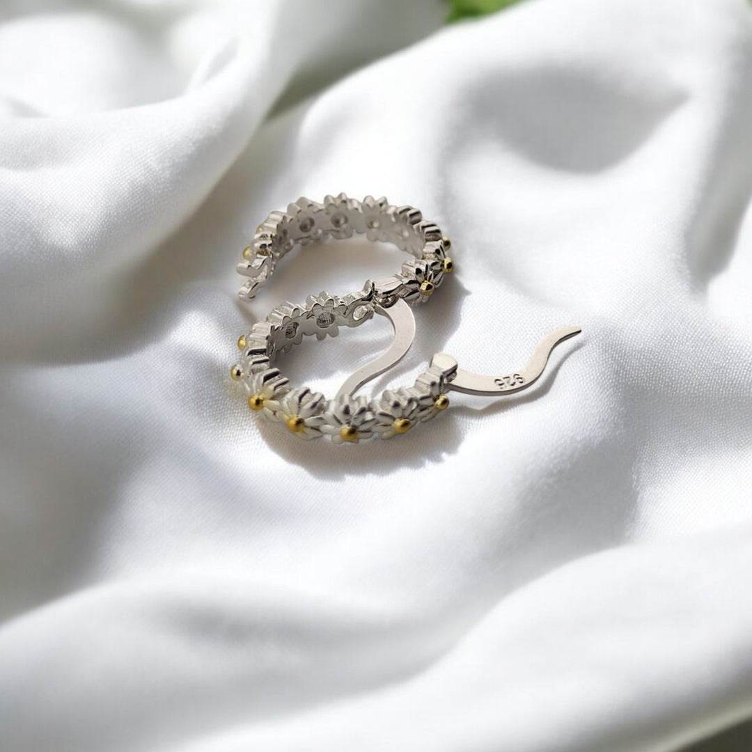 Hoop earrings shown from the back, highlighting their delicate craftsmanship