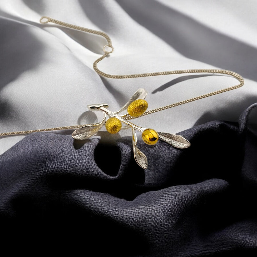 Olive branch necklace with three golden olives styled on satin – RossJewelrys