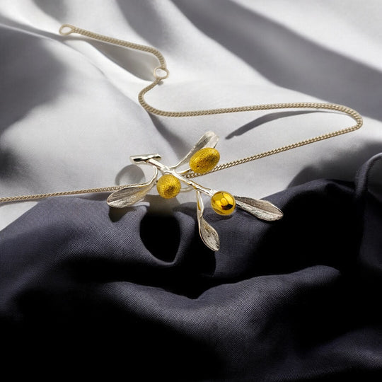 Olive branch necklace with three golden olives styled on satin – RossJewelrys