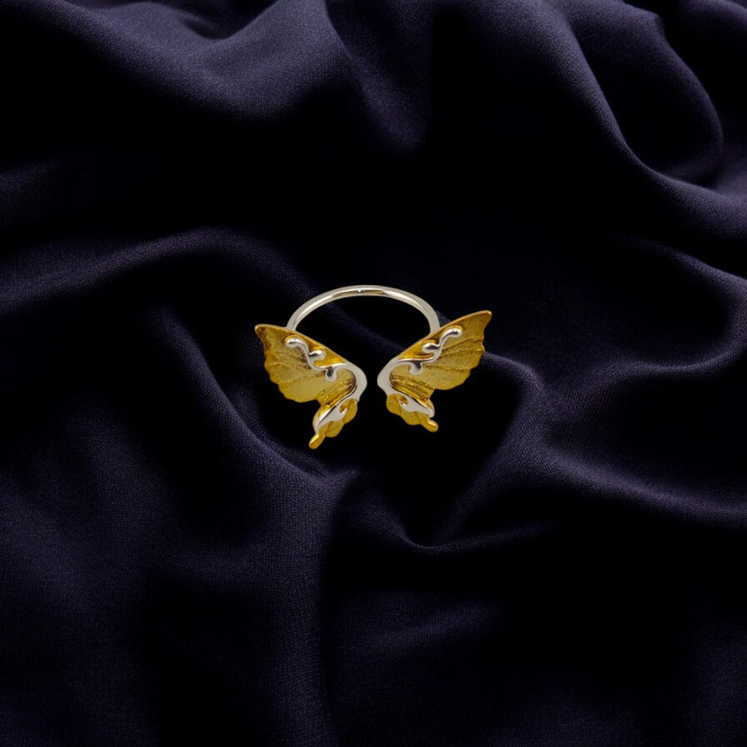 Front view of the butterfly wing ring showing symmetrical design

