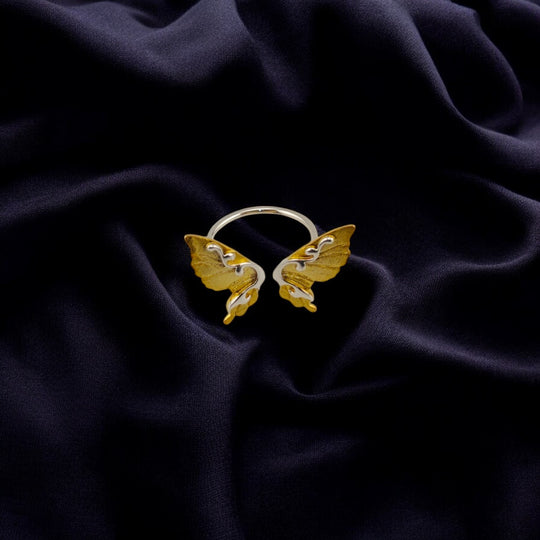 Front view of the butterfly wing ring showing symmetrical design

