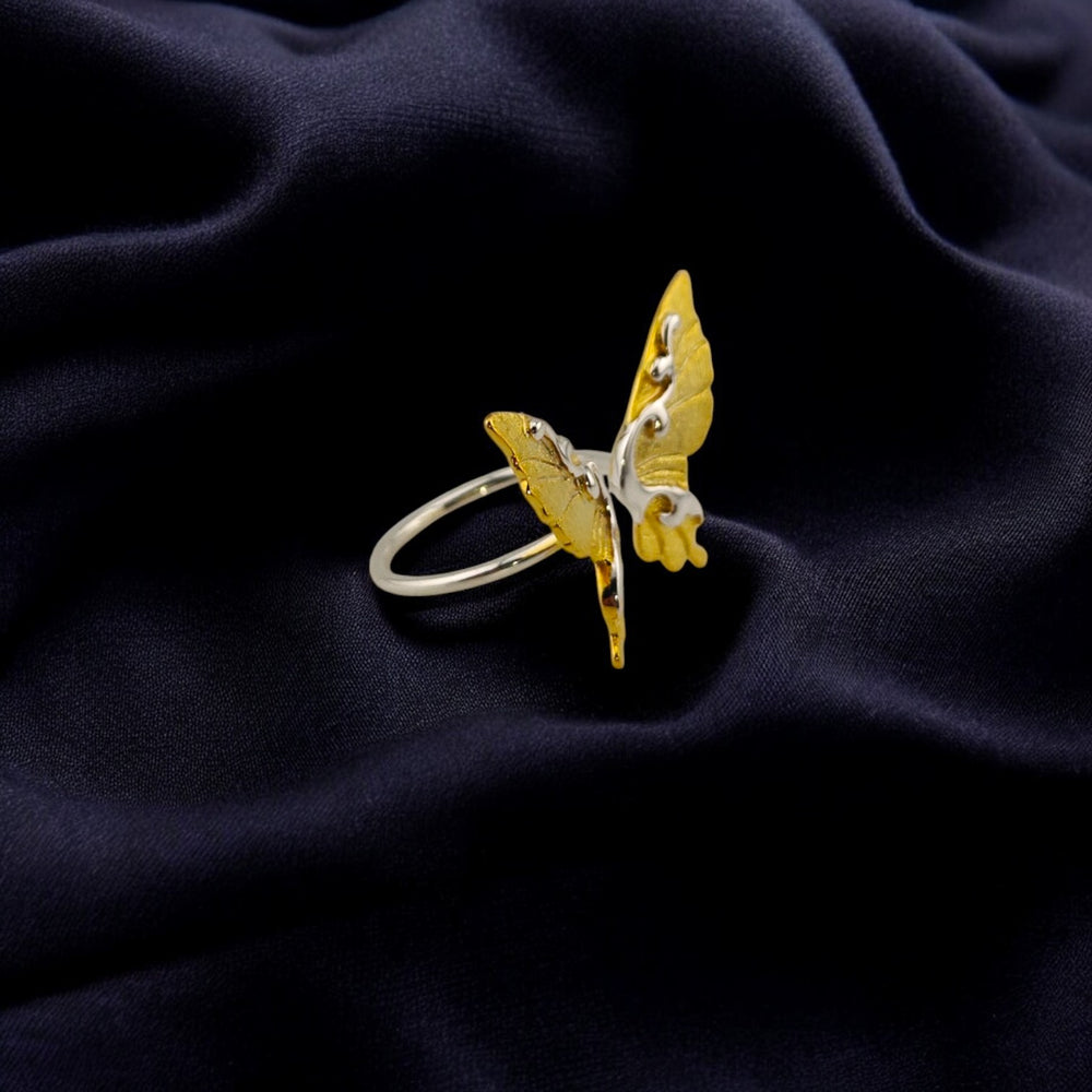 Side view of the butterfly ring showcasing its 3D shape


