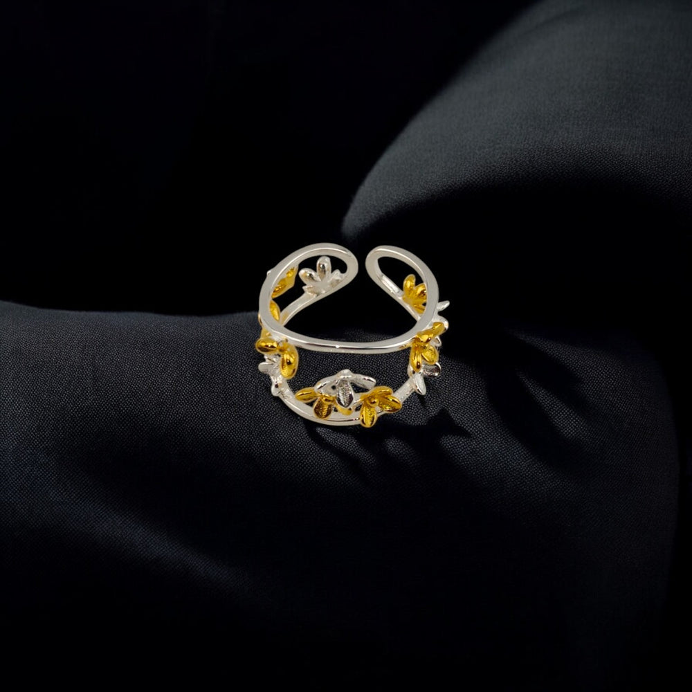 Side view of nature-inspired floral silver ring with gold accents – RossJewelrys

