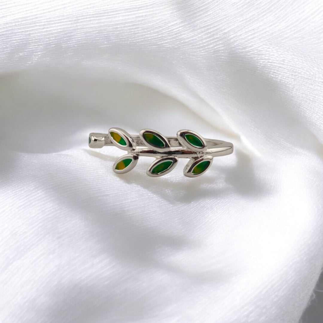 Close-up of branch ring with detailed green and yellow leaves