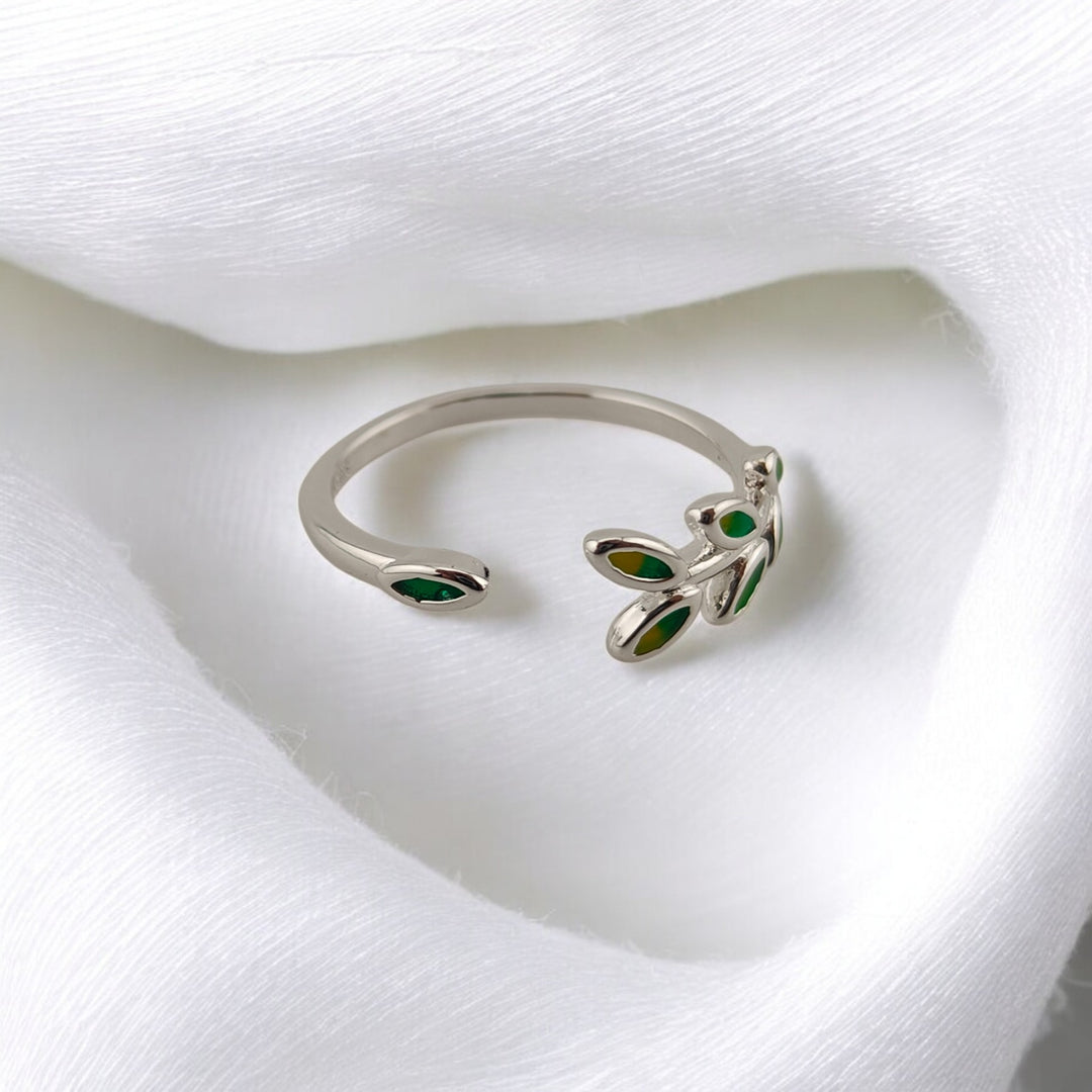 Side view of adjustable ring with multiple green leaves
