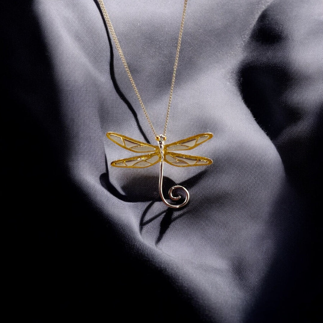 White-gold dragonfly pendant with gold chain from RossJewelrys – elegant and symbolic.

