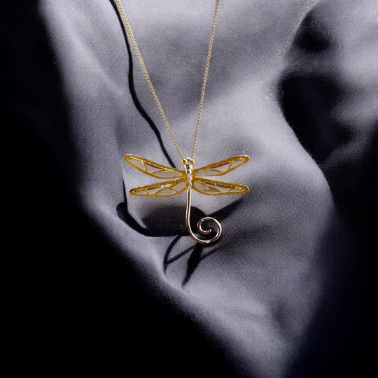 White-gold dragonfly pendant with gold chain from RossJewelrys – elegant and symbolic.

