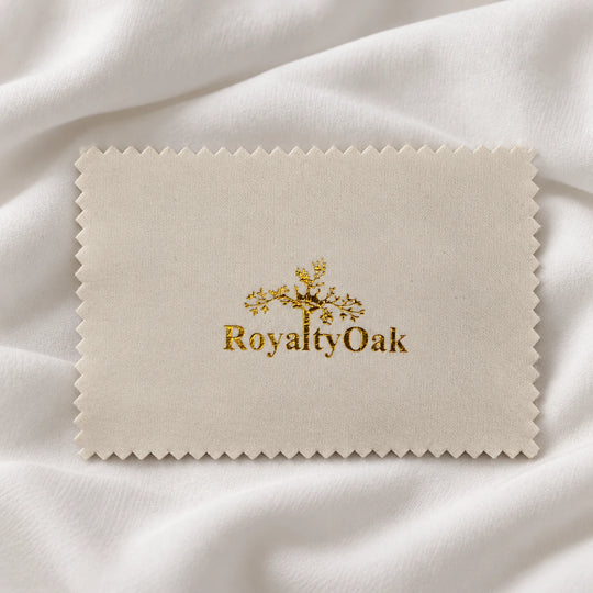 Close-up of the RoyaltyOak logo on the jewelry polishing cloth