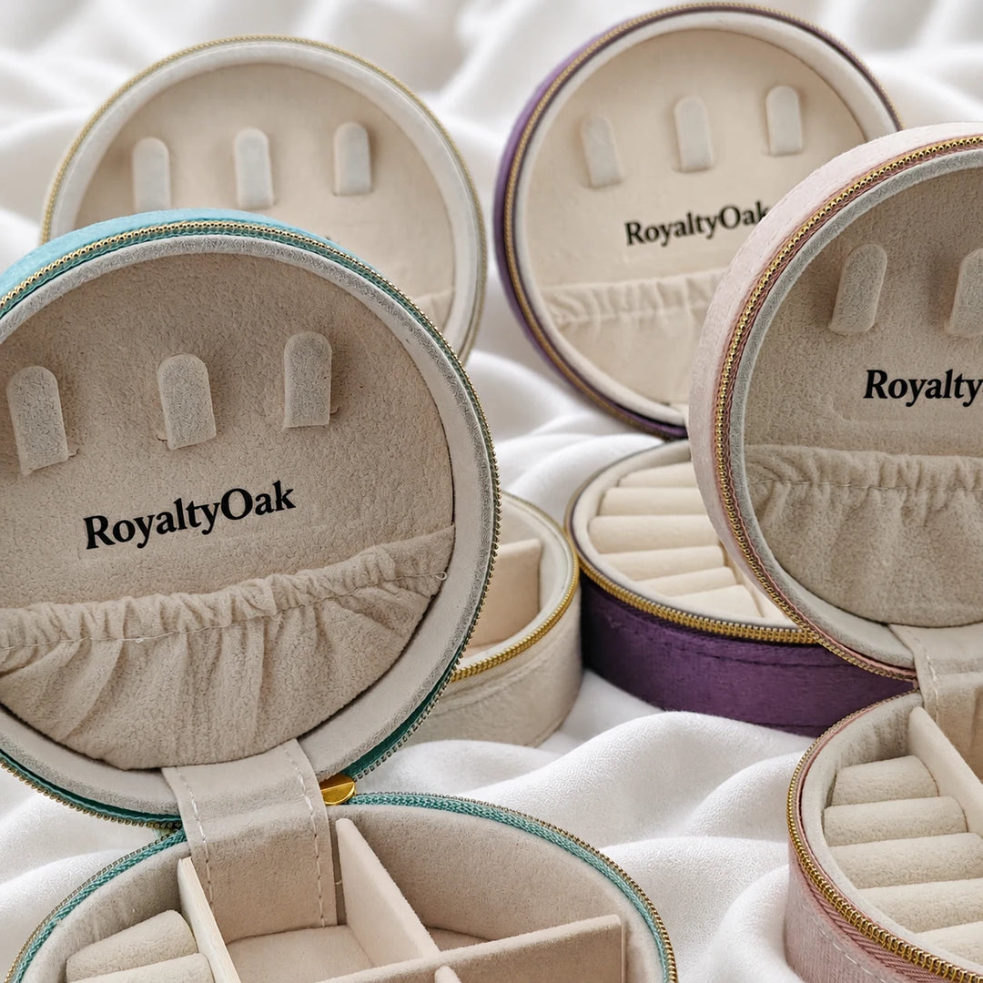Close-up of the necklace hooks and divided interiors of open RoyaltyOak jewelry cases