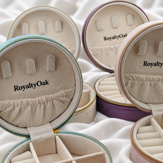 Close-up of the necklace hooks and divided interiors of open RoyaltyOak jewelry cases
